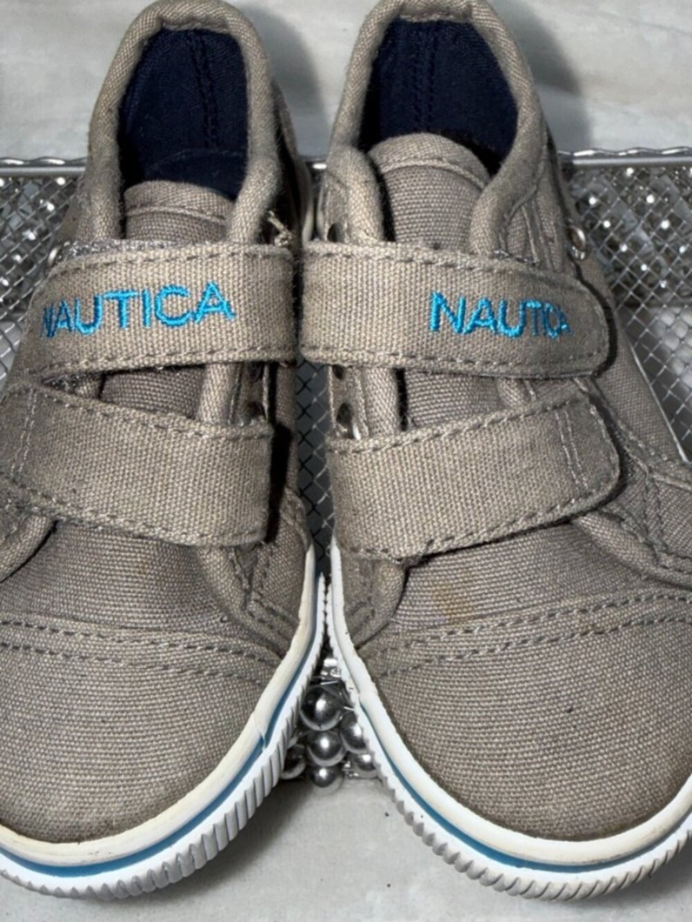 Nautica Kids Shoes Used size 6. Grey and light blue lettering.